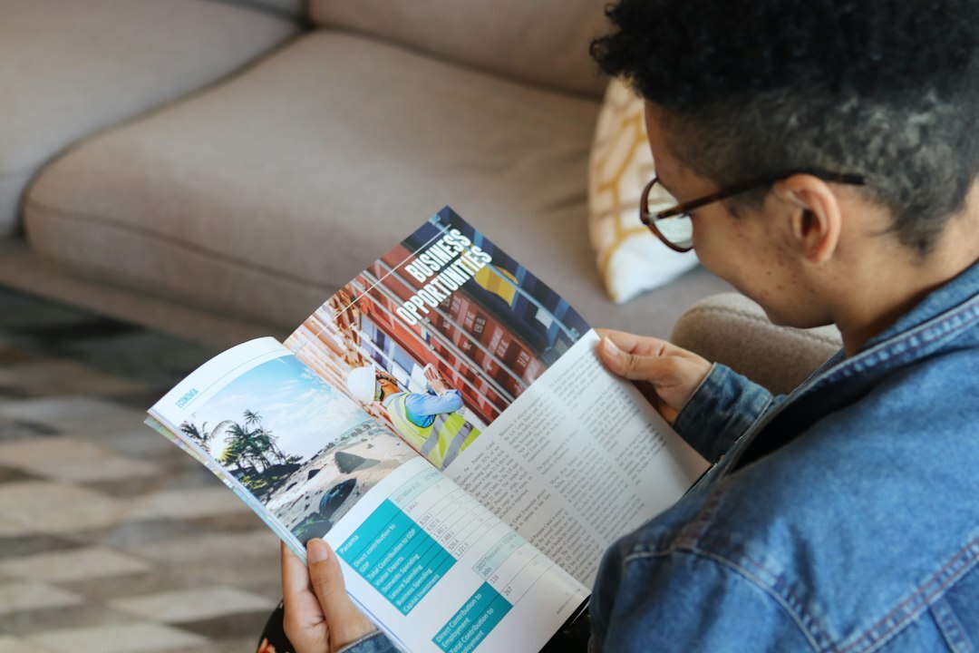 person reading magazine