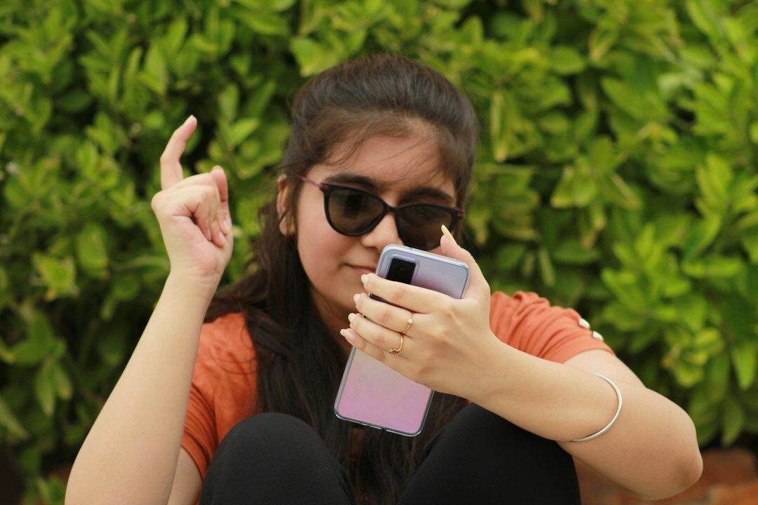 influencer posing with phone
