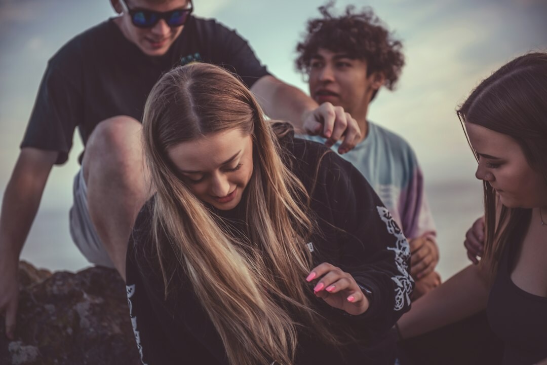 group of teens discussing trends